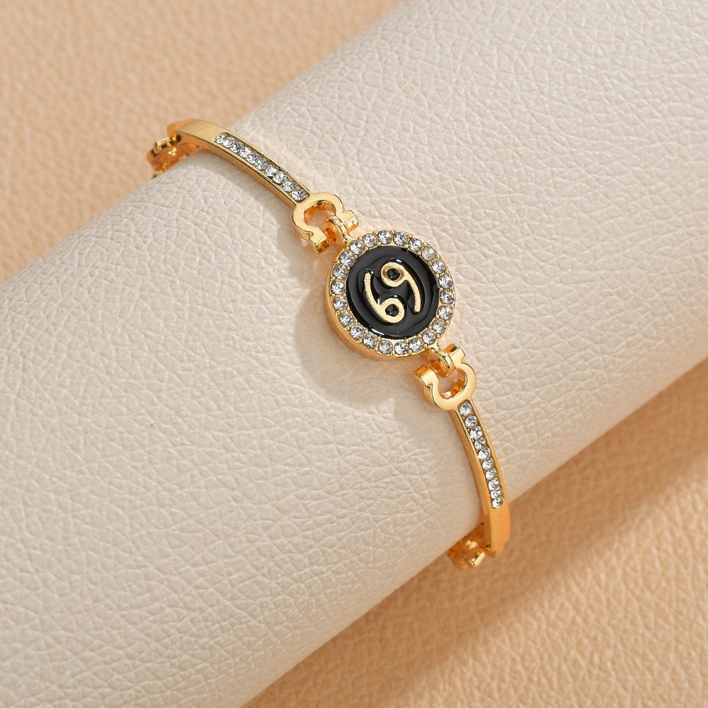 Wholesale Drip Oil 12 Constellation Gold Rhinestone Alloy Bracelet
